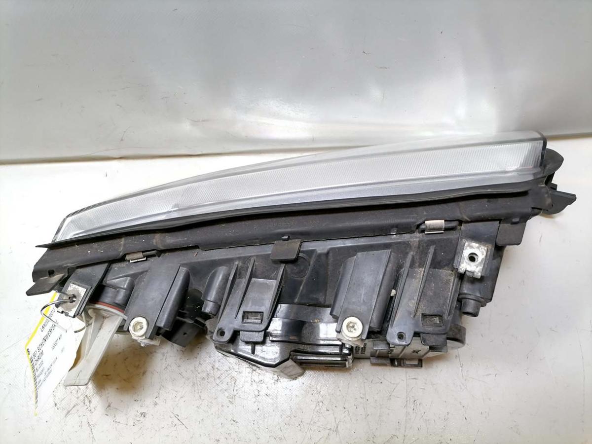 Skoda Fabia 6Y Scheinwerfer links Halogen Chrom Hintergrund Hersteller TYC Bj.2002